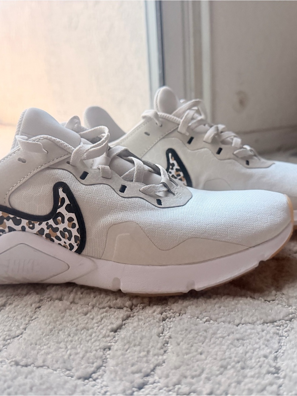 Nike White Sneakers with Leopard-Print Swoosh